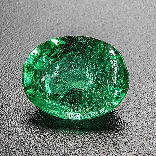 Emerald from Zambia. 1.62 Carat. Very slight asymmetry can be hidden in bezel setting