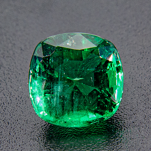 Emerald from Zambia. 1.12 Carat. Cushion, distinct inclusions