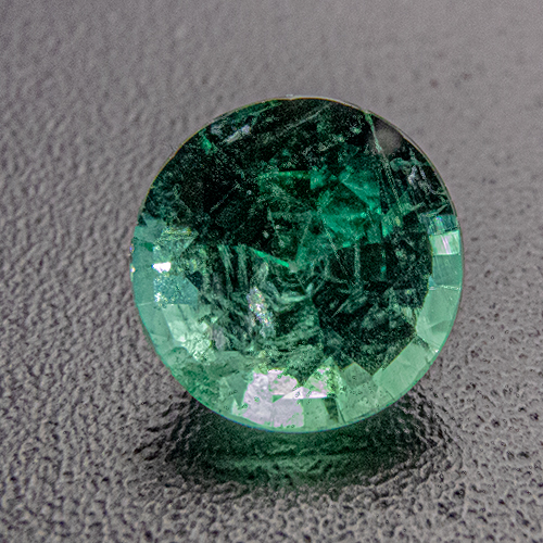 Emerald from Zambia. 0.43 Carat. Round, small inclusions