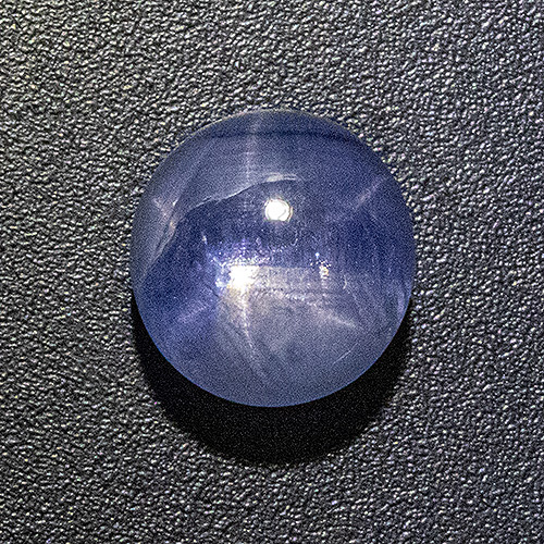 Star Sapphire from Sri Lanka. 4.09 Carat. Sharp star, colour zoned