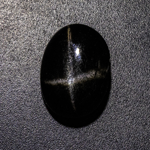 Star Diopside from India. 10.9 Carat. Cabochon Oval, opaque