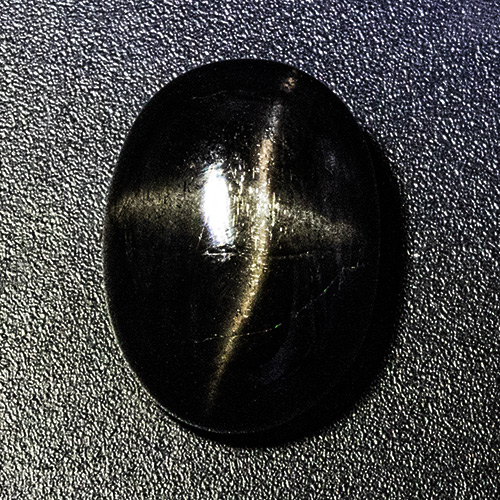 Star Diopside from India. 10.98 Carat. Cabochon Oval, opaque