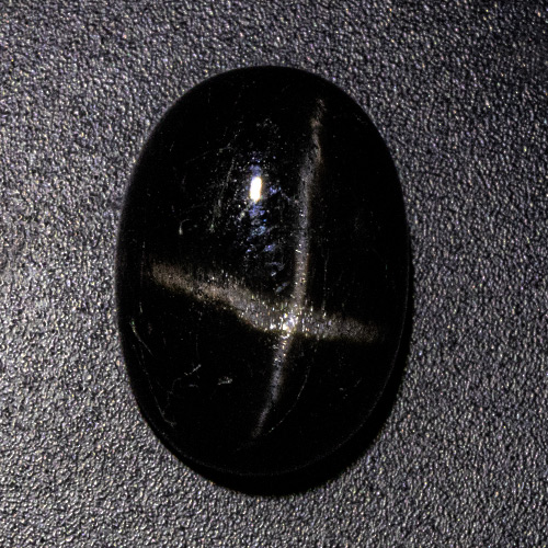 Star Diopside from India. 9.82 Carat. Cabochon Oval, opaque