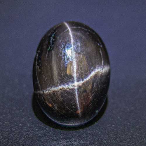 Star Diopside from India. 10.74 Carat. Cabochon Oval, opaque