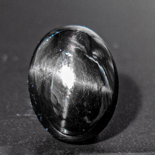 Star Diopside from India. 12.14 Carat. Cabochon Oval, opaque