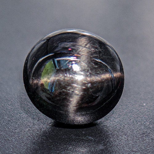Star Diopside from India. 18.08 Carat. Cabochon Round, opaque