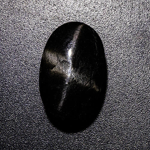 Star Diopside from India. 9.07 Carat. Cabochon Oval, opaque