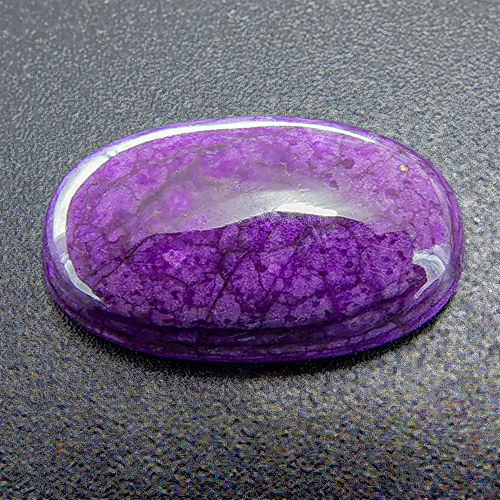 Sugilite from South Africa. 6.68 Carat. Cabochon Oval, opaque