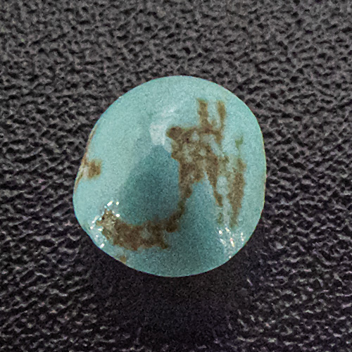 Turquoise from Iran. 0.21 Carat. Cabochon Oval, opaque