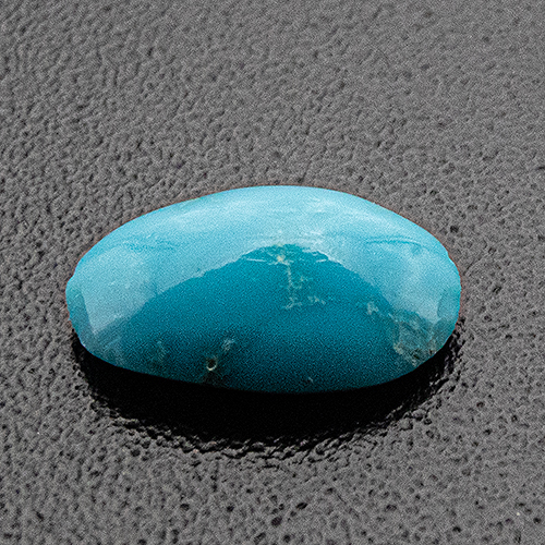 Turquoise from Iran. 0.3 Carat. Cabochon Oval, opaque