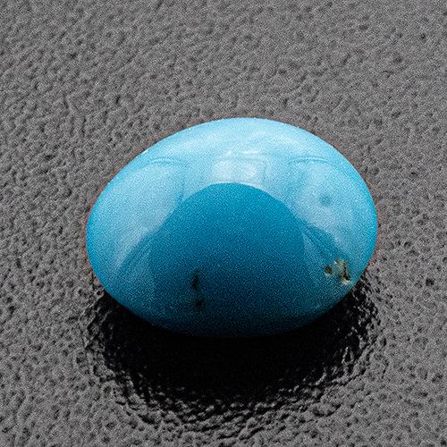 Turquoise from Iran. 0.32 Carat. Cabochon Oval, opaque