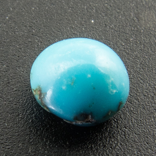 Turquoise from Iran. 0.32 Carat. Cabochon Round, opaque