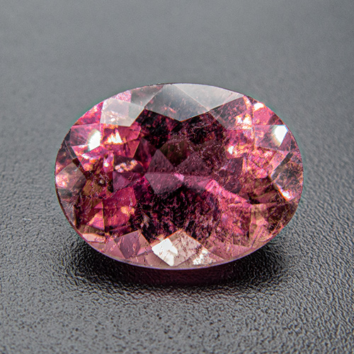 Tourmaline (Rubellite) from Brazil. 4.11 Carat. Oval, very distinct inclusions