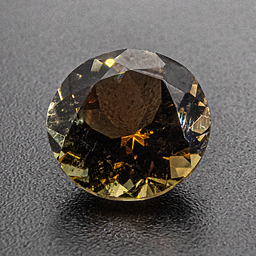 Brown tourmaline (Dravite). 1.81 Carat. Round, small inclusions