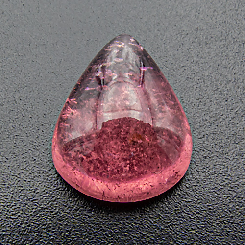 Tourmaline (Rubellite) from Brazil. 5.94 Carat. Cabochon Pear, very distinct inclusions