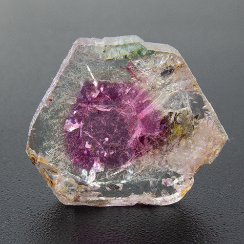 Tourmaline from Pakistan. 0.73 Gramm. Disc, very, very distinct inclusions