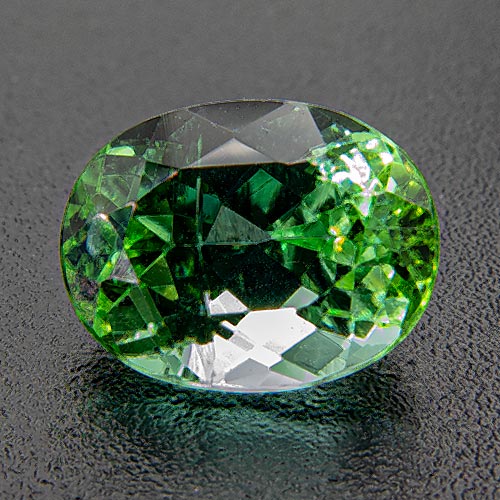 Tourmaline (Verdelite) from Brazil. 1.88 Carat. Beautiful colour, very lively gem. Due to a large crack perpendicular to the table, this stone should be set in prongs or glued into a bezel setting.